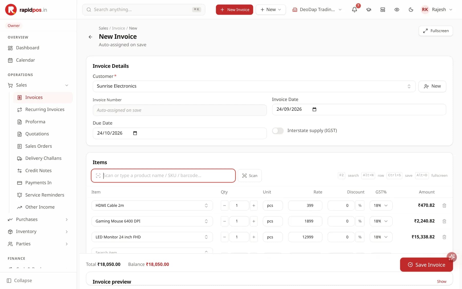 The New Invoice screen with a customer selected, invoice and due dates, an Interstate supply toggle, and an items table containing two products with quantity, rate, discount, GST percentage and amount columns. A Save Invoice button sits in the bottom bar.